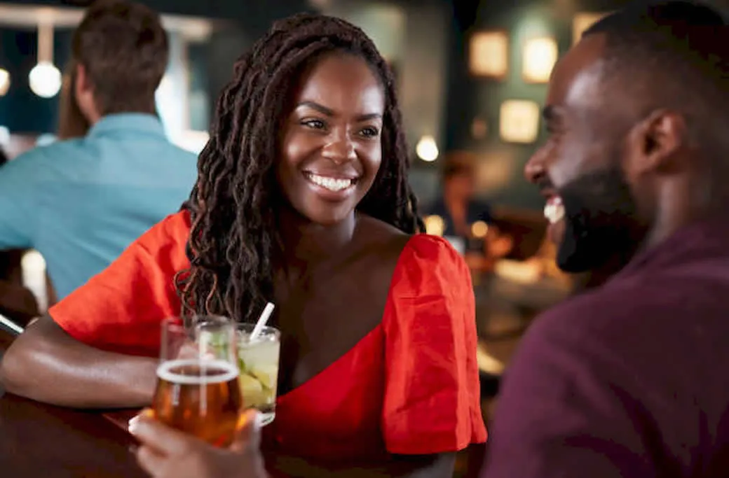 Black BDSM munch gathering in South Florida – community members talking over drinks